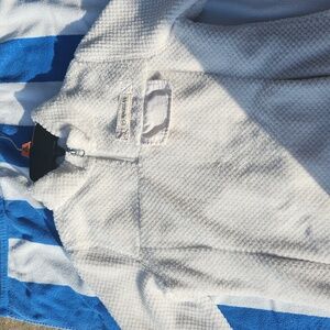 A kids medium 1/4 zip white. Very soft and luscious from Magellan